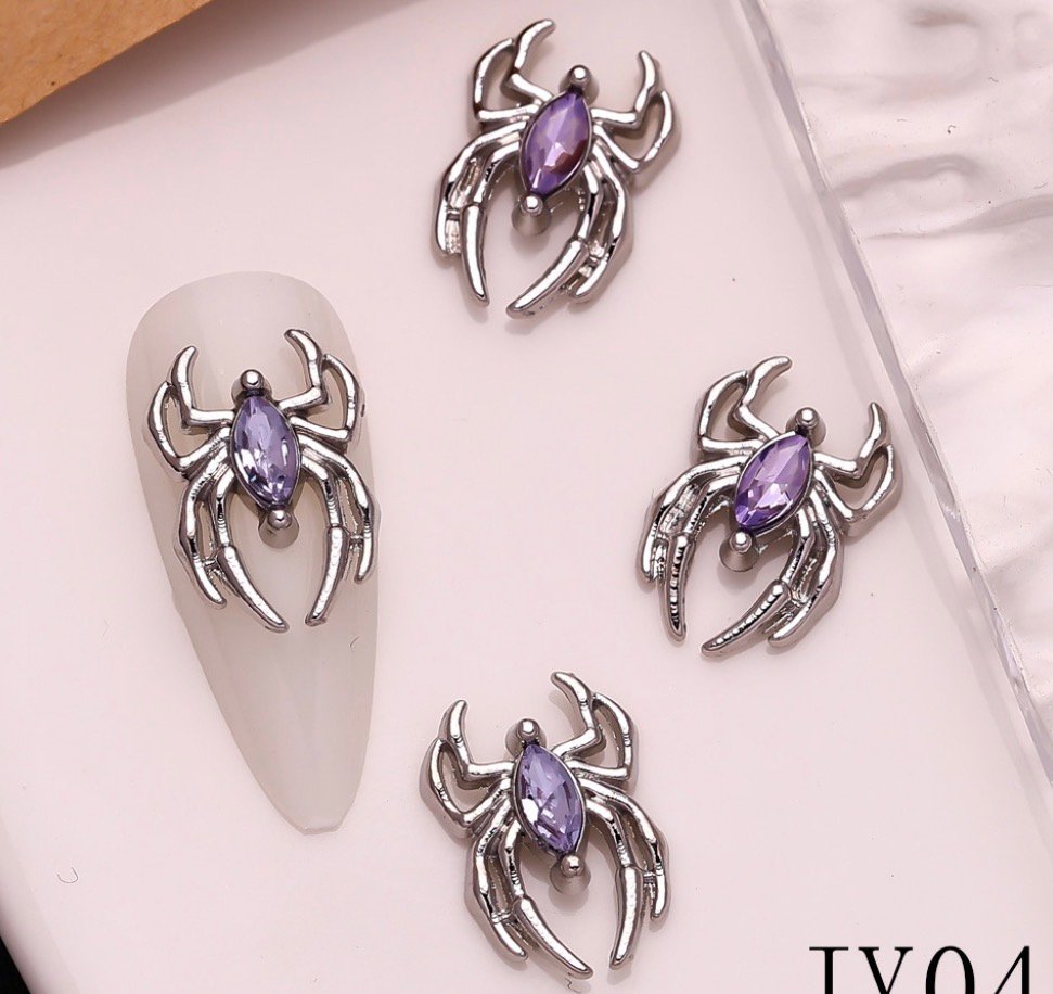 Spider brooch for nails