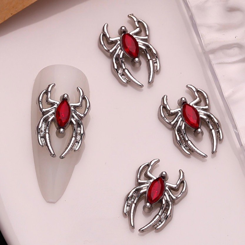 Spider brooch for nails