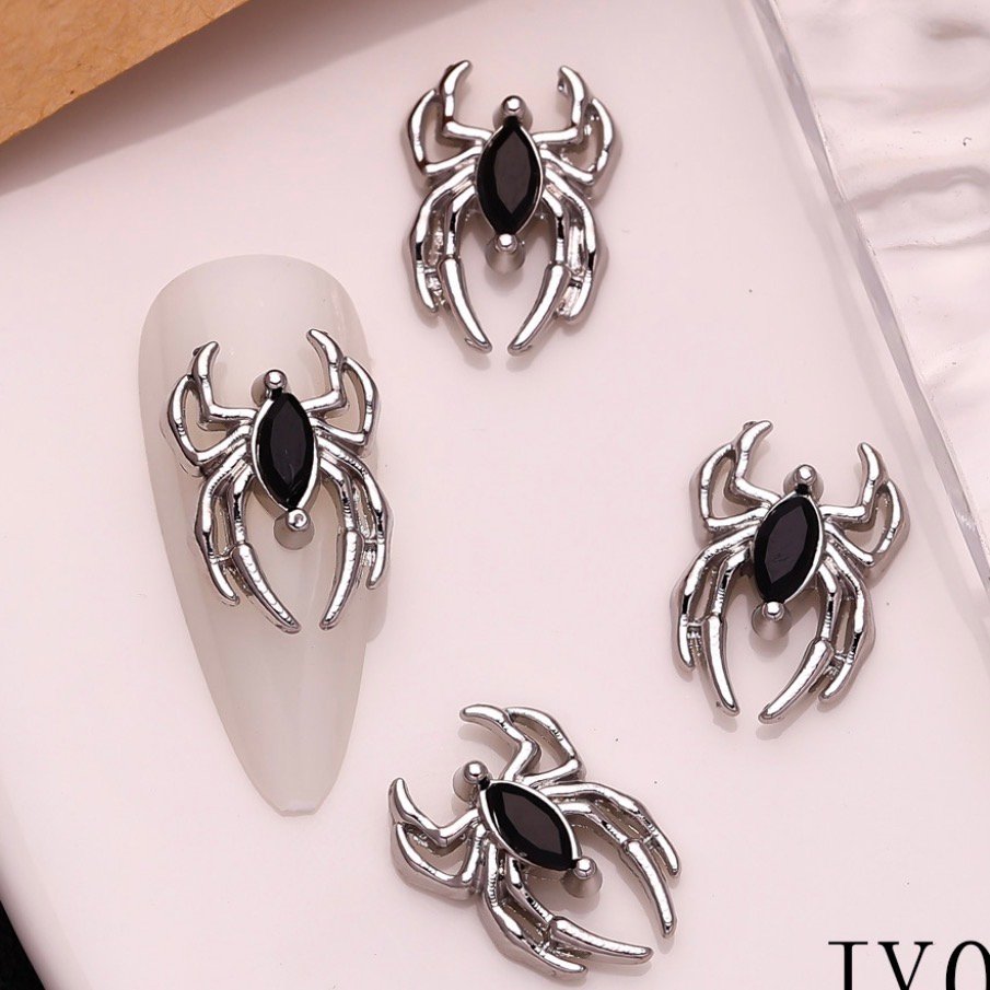 Spider brooch for nails