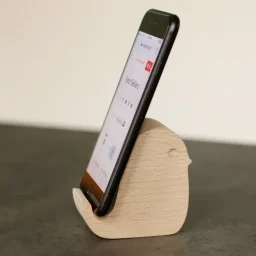 كيكر لاند حامل هاتف خشبي على شكل طائر Kikkerland Bird Beechwood Phone Stand
