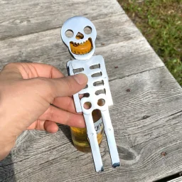 كيكر لاند مفتاح زجاجات هيكل عظمي Kikkerland Skeleton Bottle Opener