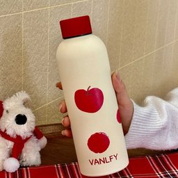 مطارة ماء كريمية بغطاء أحمر – تفاحة أو جرو Cream Water Bottle with Red Lid – Apple or Puppy