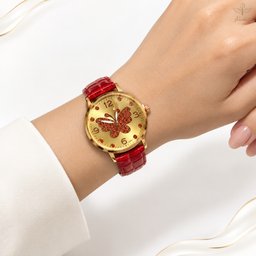 ساعة الفراشة الذهبية بميناء الياقوت وسوار الجلد الأحمر الملكي | من متجر عشتار Gold Butterfly Watch with Ruby Dial and Red Leather Strap | From Ishtar Store