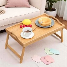 صينيه خشب بأرجل A tray of wood.