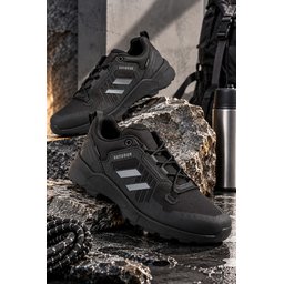 حذاء MUGGO TORVEX شتوي للجنسين برباط ونعل سميك للمشي والرحلات - أسود MUGGO TORVEX Unisex Winter Lace-Up Thick Sole Outdoor Trekking Boot - Black