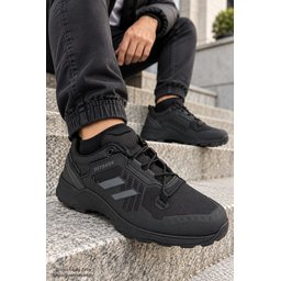 حذاء MUGGO TORVEX شتوي للجنسين برباط ونعل سميك للمشي والرحلات - أسود MUGGO TORVEX Unisex Winter Lace-Up Thick Sole Outdoor Trekking Boot - Black
