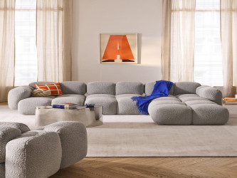 أريكة تايلا المريحة والمجعّدة ذات الأربعة مقاعد مع مسند قدم Comfortable and curly Tayla four-seater sofa with footstool