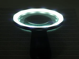 عدسة مكبرة محمولة بتكبير 10 أضعاف Portable magnifying glass with 10x magnification