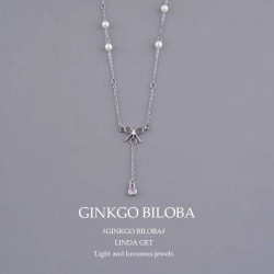 قلادة فيونكة فضي Silver bow necklace