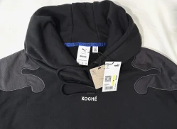 هودي قصير نسائي مطرز أسود بوما × كوشيه Puma x Koche Women's Embroidered Crop Hoodie - Black