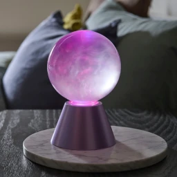 مصباح كرة كوني متغير الألوان بتأثير ضبابي ساحر A color-changing cosmic ball lamp with a magical misty effect