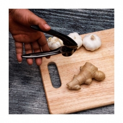 اداة هرس الثوم Garlic Presser with Gripped Handle 