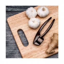 اداة هرس الثوم Garlic Presser with Gripped Handle 