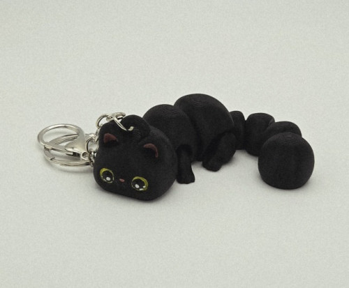 مدالية القطة اللطيفة المتحركة Flexi Cute Cat Keychain